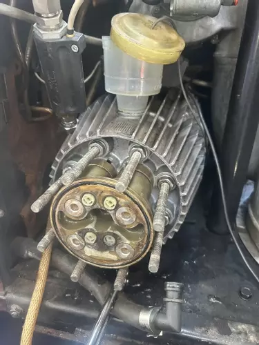 Before refurbishment of the C3 pump head during servicing work on a heavily used Nilfisk Neptune 7. The pump was stripped down for inspection after prolonged heavy use, allowing worn internal components, valves, and seals to be checked before rebuilding.